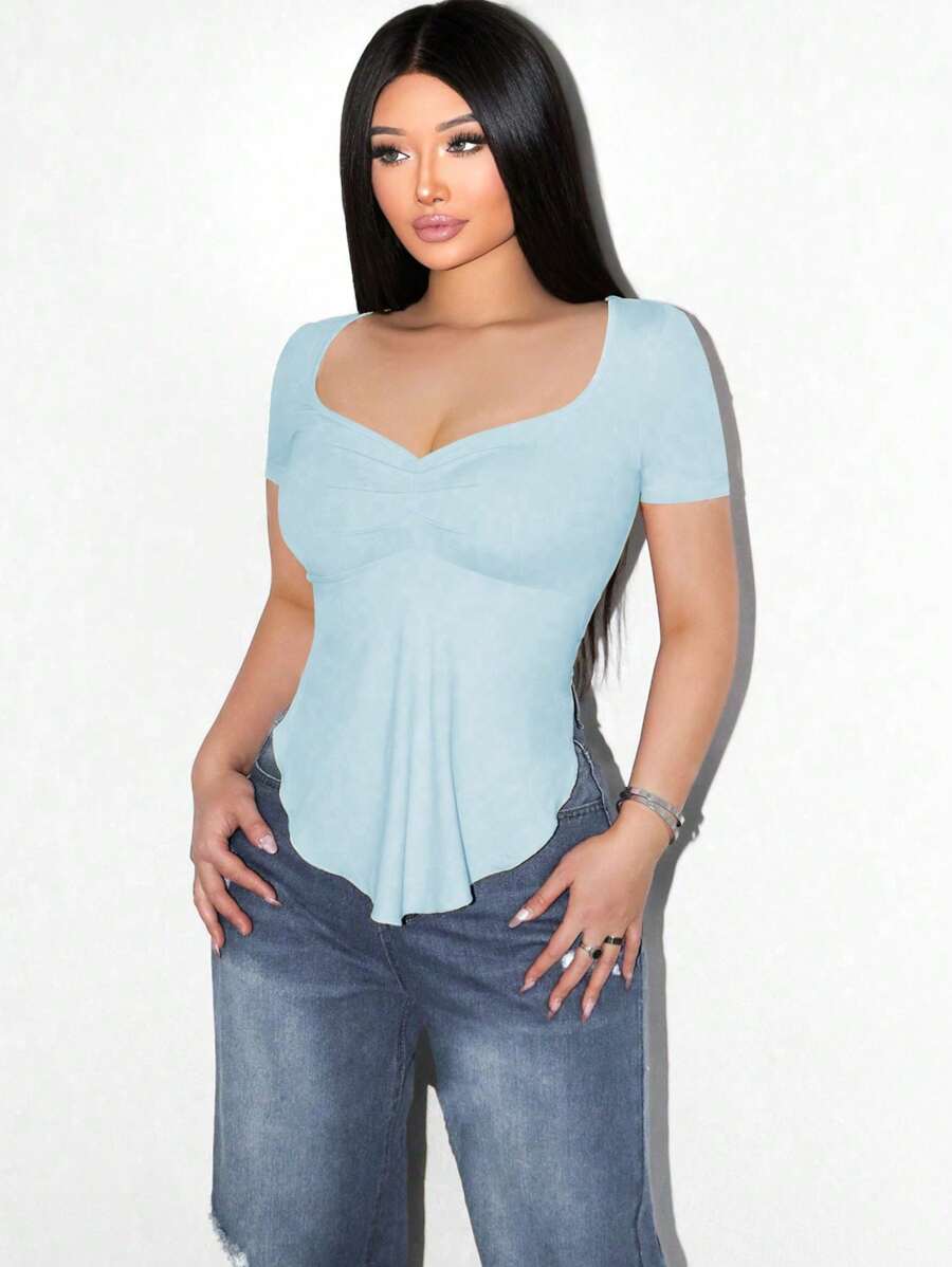 Sirith Camiseta de manga larga con cuello cuadrado y bajo asimétrico de unicolor casual para mujer Foxxy