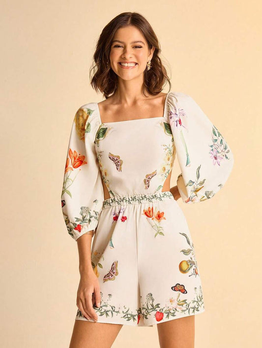CAJUNI Mono de mujer con estampado floral tropical bohemio, cintura hueca con nudo, mangas abullonadas y espalda descubierta