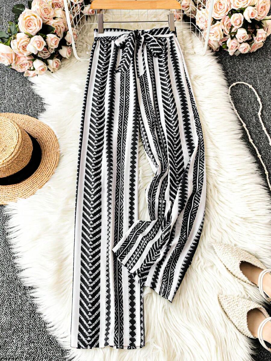 SHEIN LUNE Pantalones anchos de cintura elástica con estampado todo sobre para vacaciones informales