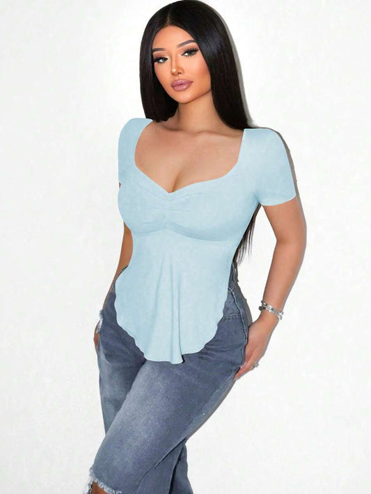 Sirith Camiseta de manga larga con cuello cuadrado y bajo asimétrico de unicolor casual para mujer Foxxy