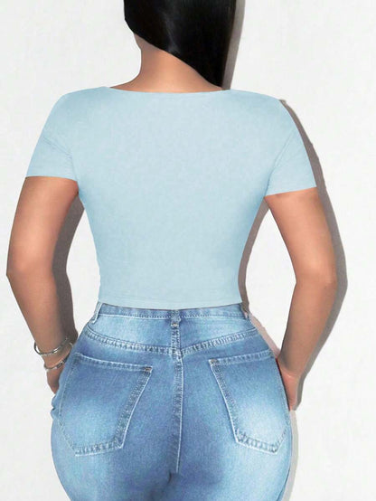 Sirith Camiseta de manga larga con cuello cuadrado y bajo asimétrico de unicolor casual para mujer Foxxy