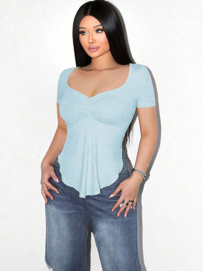 Sirith Camiseta de manga larga con cuello cuadrado y bajo asimétrico de unicolor casual para mujer Foxxy