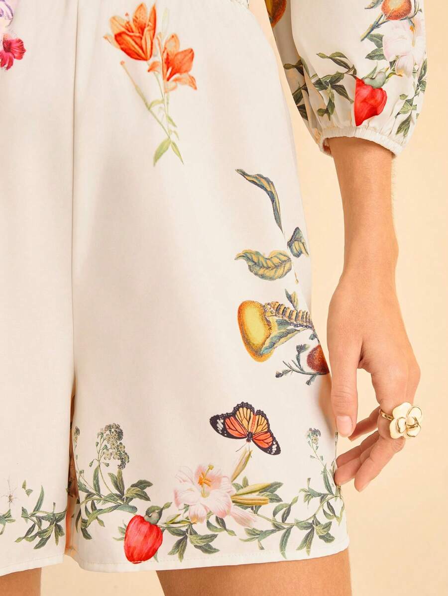 CAJUNI Mono de mujer con estampado floral tropical bohemio, cintura hueca con nudo, mangas abullonadas y espalda descubierta