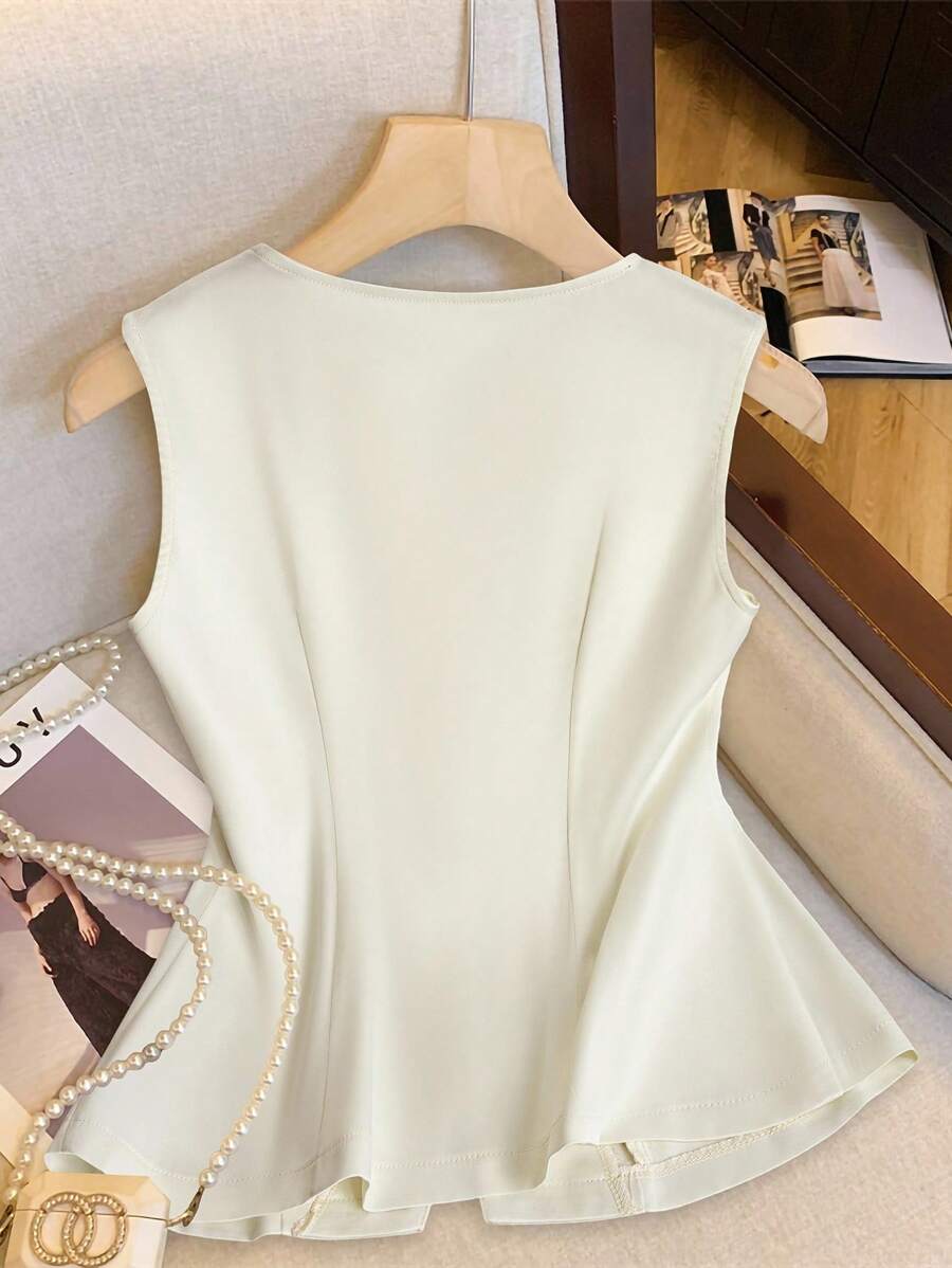 Franclia Blusa de mujer casual y elegante de unicolor, sin mangas y con botones frontales