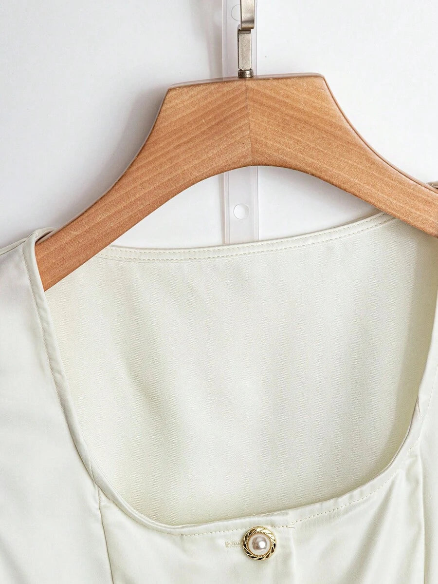 Franclia Blusa de mujer casual y elegante de unicolor, sin mangas y con botones frontales