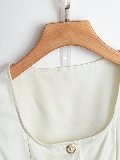 Franclia Blusa de mujer casual y elegante de unicolor, sin mangas y con botones frontales